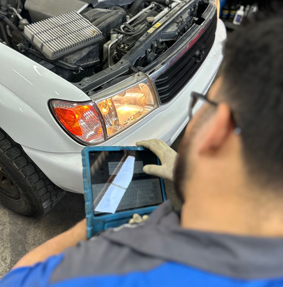 technician holding  a tablet